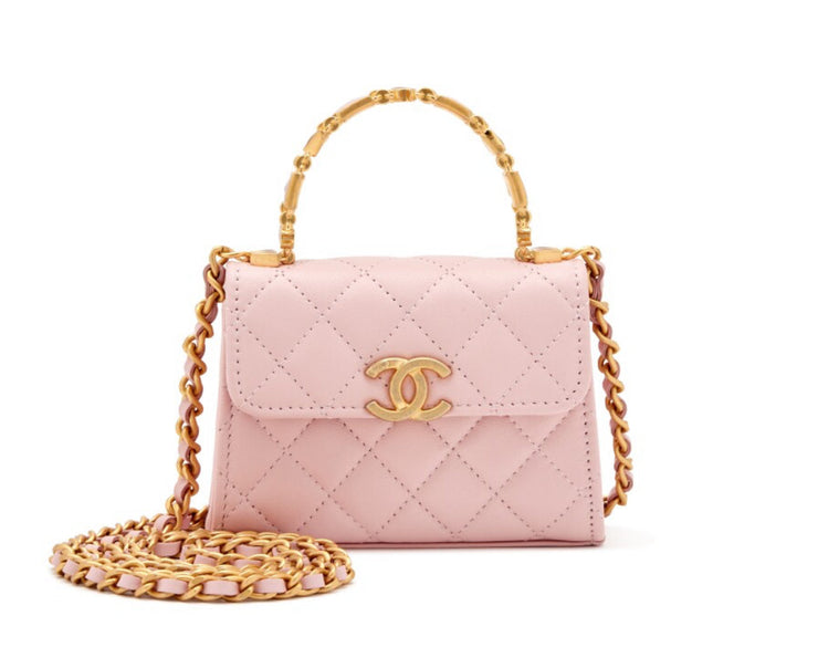 Chanel
Pink Quilted Lambskin Enamel Micro Extra Mini Handle Clutch with Chain Brushed Gold Hardware, 2022