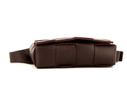 Pochette-cintura Bottega Veneta Cassette in pelle intrecciata plum
