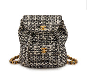 Chanel
Black and White Quilted Sequin Tweed Medium Duma Timeless CC Backpack Gold Hardware, 1994