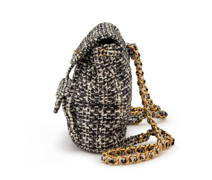 Chanel
Black and White Quilted Sequin Tweed Medium Duma Timeless CC Backpack Gold Hardware, 1994