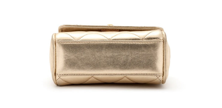 Chanel
Metallic Gold Quilted Lambskin Mini Flap Gold Hardware, 1994-1996