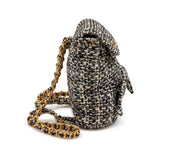 Chanel
Black and White Quilted Sequin Tweed Medium Duma Timeless CC Backpack Gold Hardware, 1994