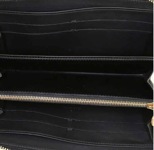 Portafogli Louis Vuitton Zippy in tela monogram cerata color crema con motivo