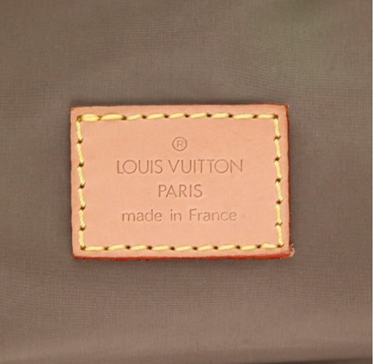 Borsa da viaggio Louis Vuitton Attaquant in tela beige e pelle naturale