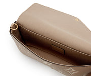 Louis Vuitton
Tourterelle and Crème Monogram Empreinte Pochette Félicie Gold Hardware, 2021