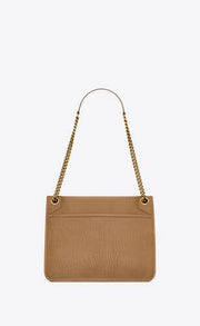 NIKI MEDIA IN PELLE DI AGNELLO MARTELLATA