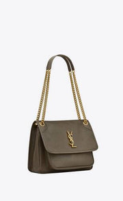 NIKI MEDIA IN PELLE DI AGNELLO MARTELLATA