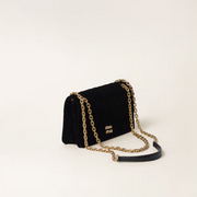 Mini borsa in velluto con lavorazione matelassé