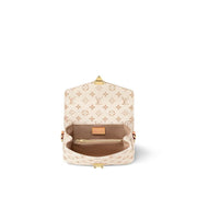 M46914 Novità Pochette Métis East West